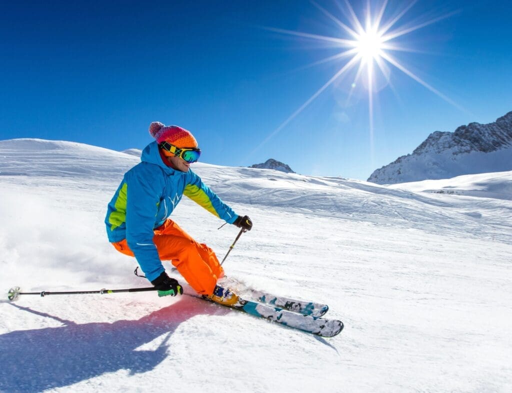 Skier skiing downhill in the high mountains — Le 1850 in Risoul