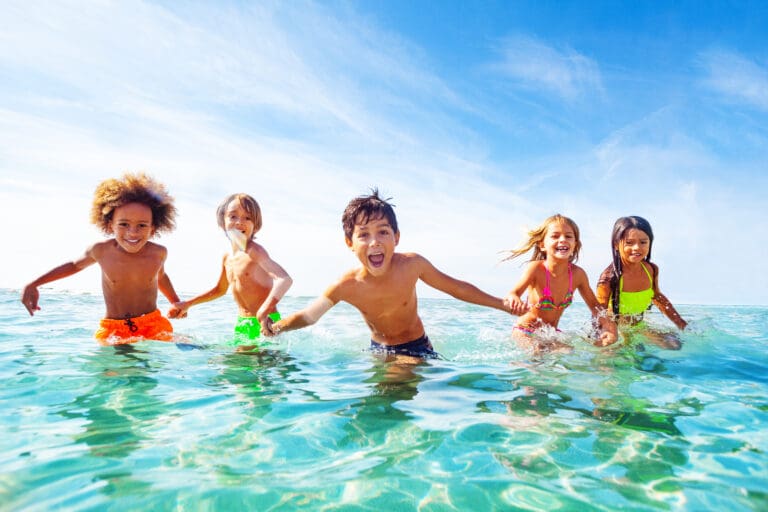 Kids laughing and playing in water at the seaside – Le Sentier des Pins, Ramatuelle