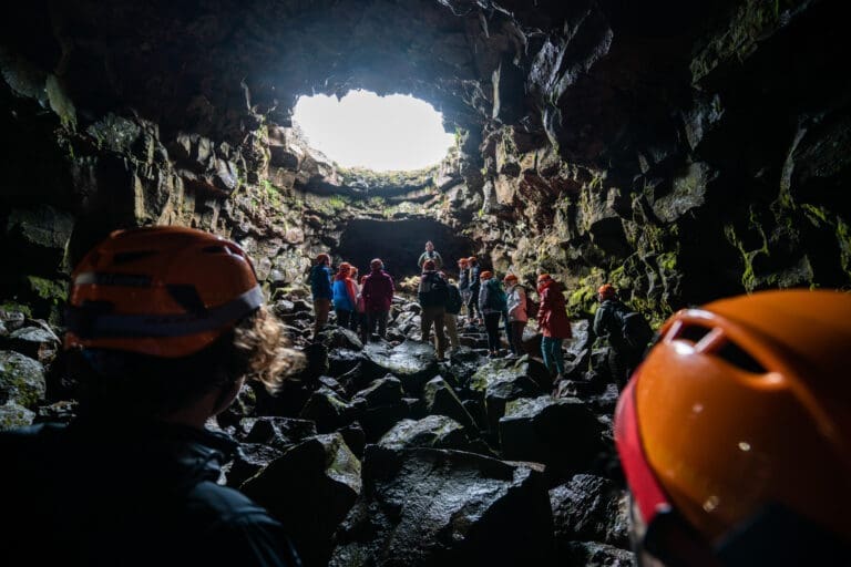 People exploring Raufarhólshellir cave in Iceland – Les Coulmes & Les Rambins activity menu 2026