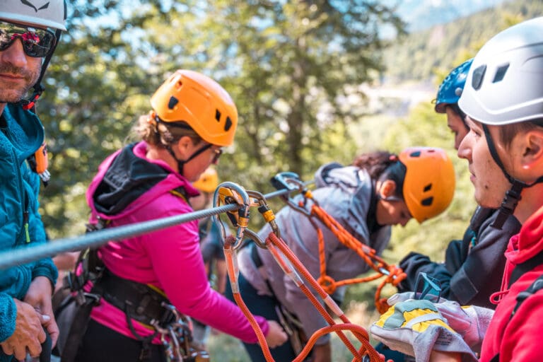 Group preparing for a zip line adventure – Treetop adventure